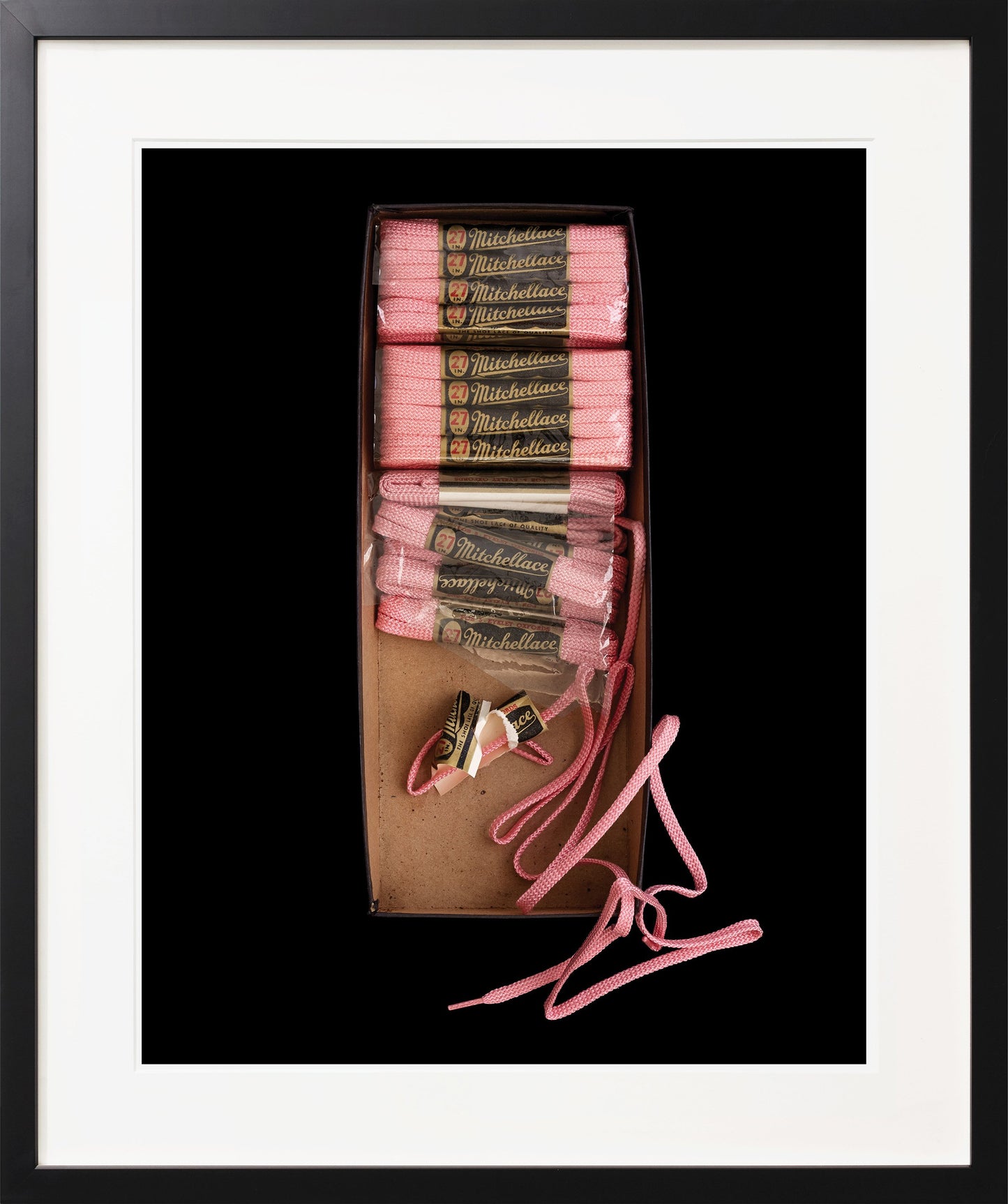 Box of pink shoelaces black frame